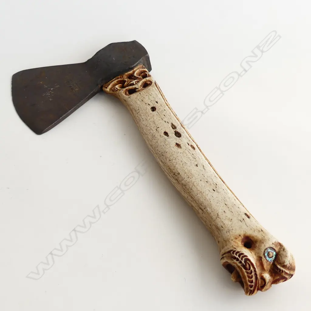 A Māori carved whalebone patiti (hatchet) by Charlie Raponi Wilson, Image 1++